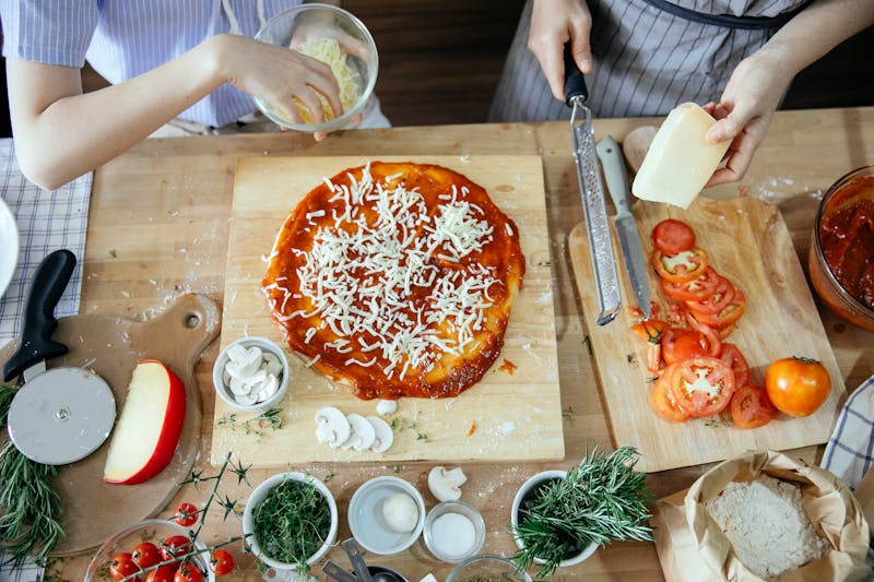 Pizza luce ingredients and fresh toppings spread