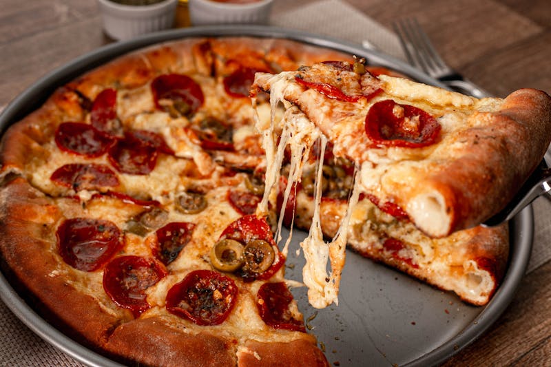 Pepperoni pizza luce style with crispy edges and melted cheese